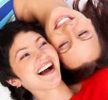 2 women laughing 2 women laughing